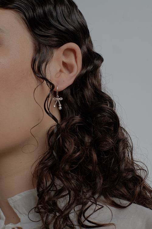 Karen walker stg love knot earrings