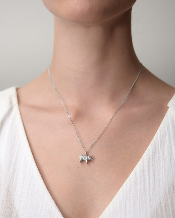 Karen walker stg lunar pig necklace