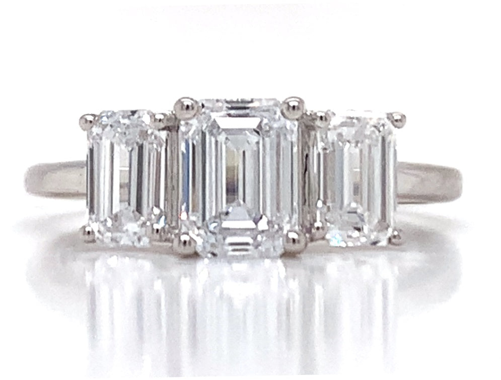 091222 18ct white gold three emerald cut lab grown diamond ring tdw 2