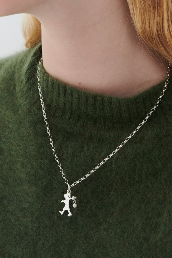 Karen walker stg girl with a pearl necklace