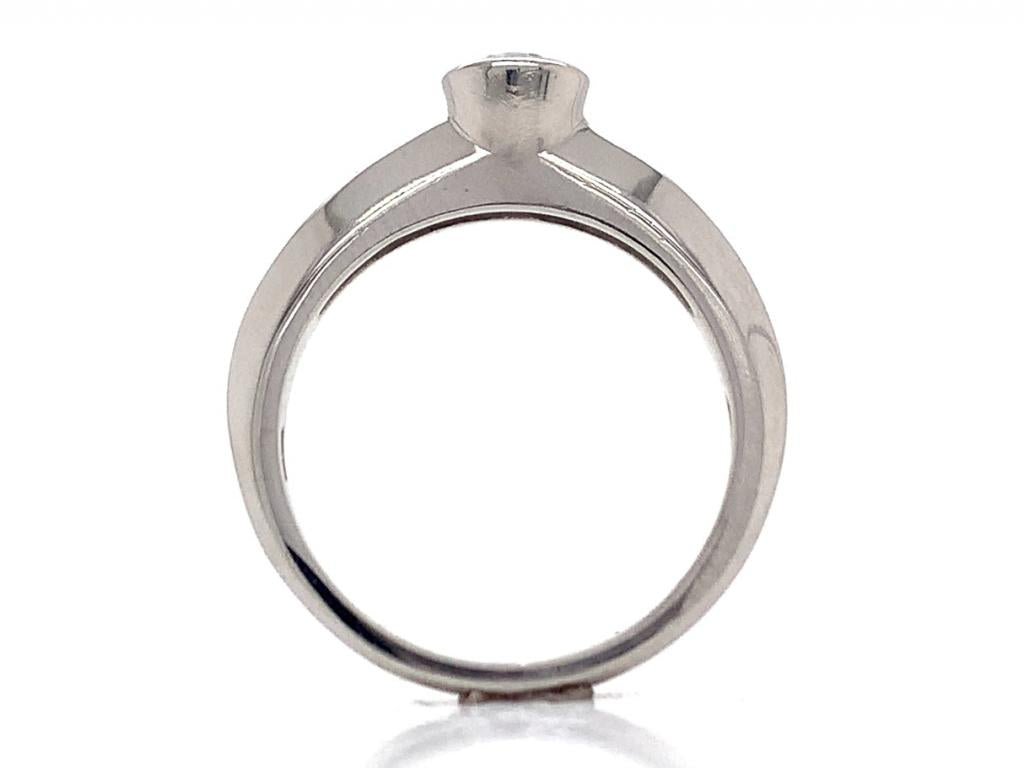 Platinum diamond rubset solitaire ring tdw 0