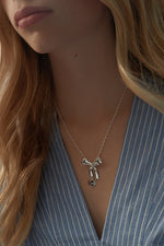 Load image into Gallery viewer, Karen Walker Stg Bow Pendant
