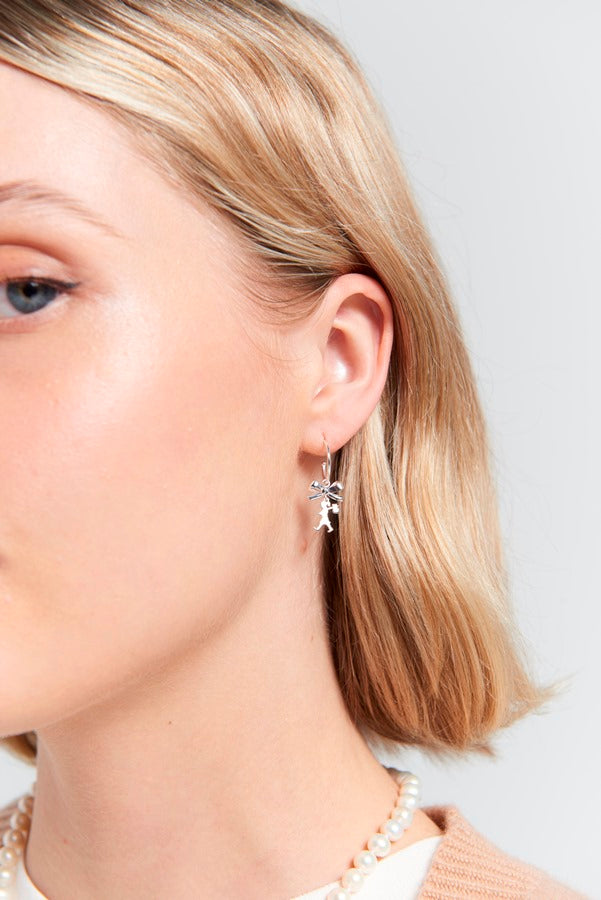 Karen walker stg mini girl with a bow hoop earrings
