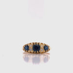 Load and play video in Gallery viewer, 18ct Three Sapphire Four Diamond Ring
