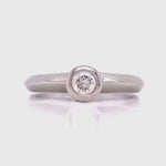 Load and play video in Gallery viewer, Platinum Diamond Rubset Solitaire Ring TDW 0.23ct
